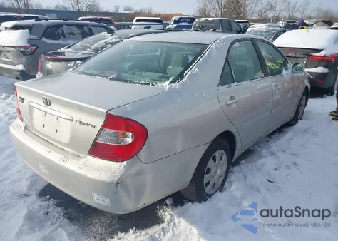2002 Toyota Camry Le z USA, uszkodzony, nr VIN 4T1BE32K72U613797